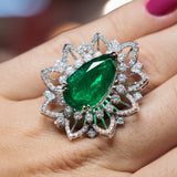 Ring with Large Emerald and Diamonds