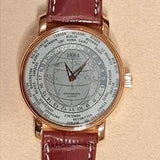 Andersen Genève 1884 Weltzeituhr in 18K Roségold mit gravierter Weltkarte
