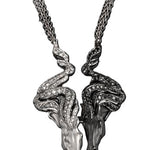 Carrera y Carrera Wild Spirit pendant necklace crafted in 18K white gold with black rhodium accents, featuring twin horse heads adorned with 125 white diamonds (1.75 ct) and 117 black diamonds (1.64 ct) on a 50 cm chain.