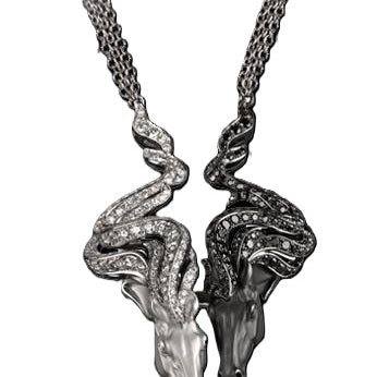 Carrera y Carrera Wild Spirit pendant necklace crafted in 18K white gold with black rhodium accents, featuring twin horse heads adorned with 125 white diamonds (1.75 ct) and 117 black diamonds (1.64 ct) on a 50 cm chain.