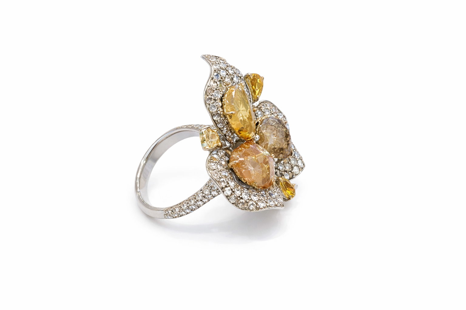 close up diamond ring and earrings pear shaped design
