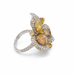 close up diamond ring and earrings pear shaped design