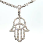 peace symbol pendant with diamonds white gold close up