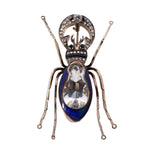 antique 14k gold insect brooch with topaz, diamonds and blue enamel on black background