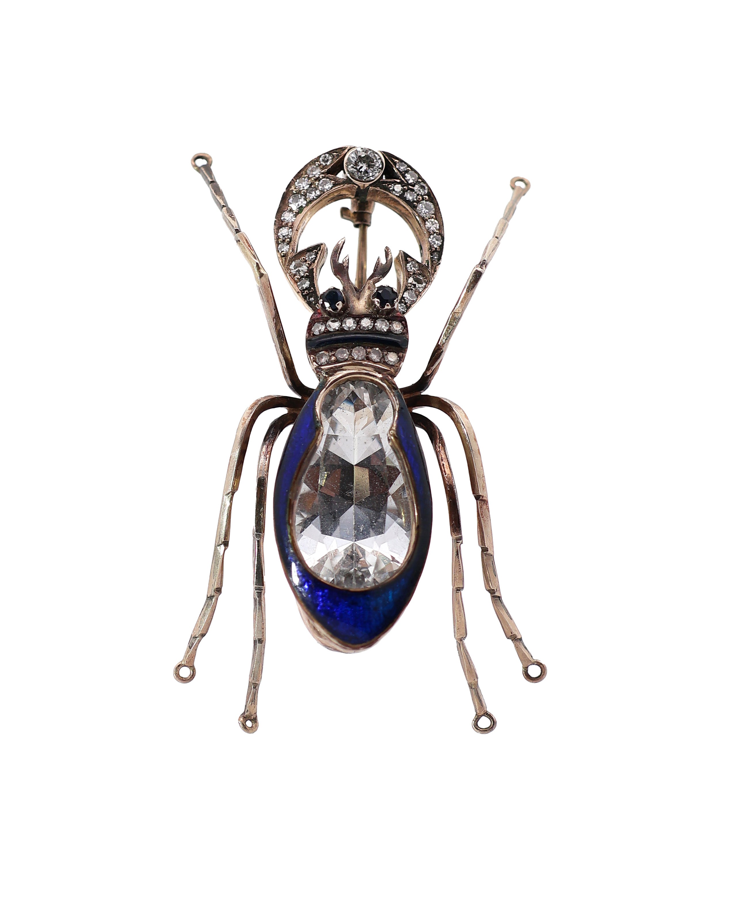 antique 14k gold insect brooch with topaz, diamonds and blue enamel on black background