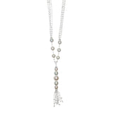 Busatti 18k gold collier necklace with diamonds and pearls featuring elegant tassel pendant on white background