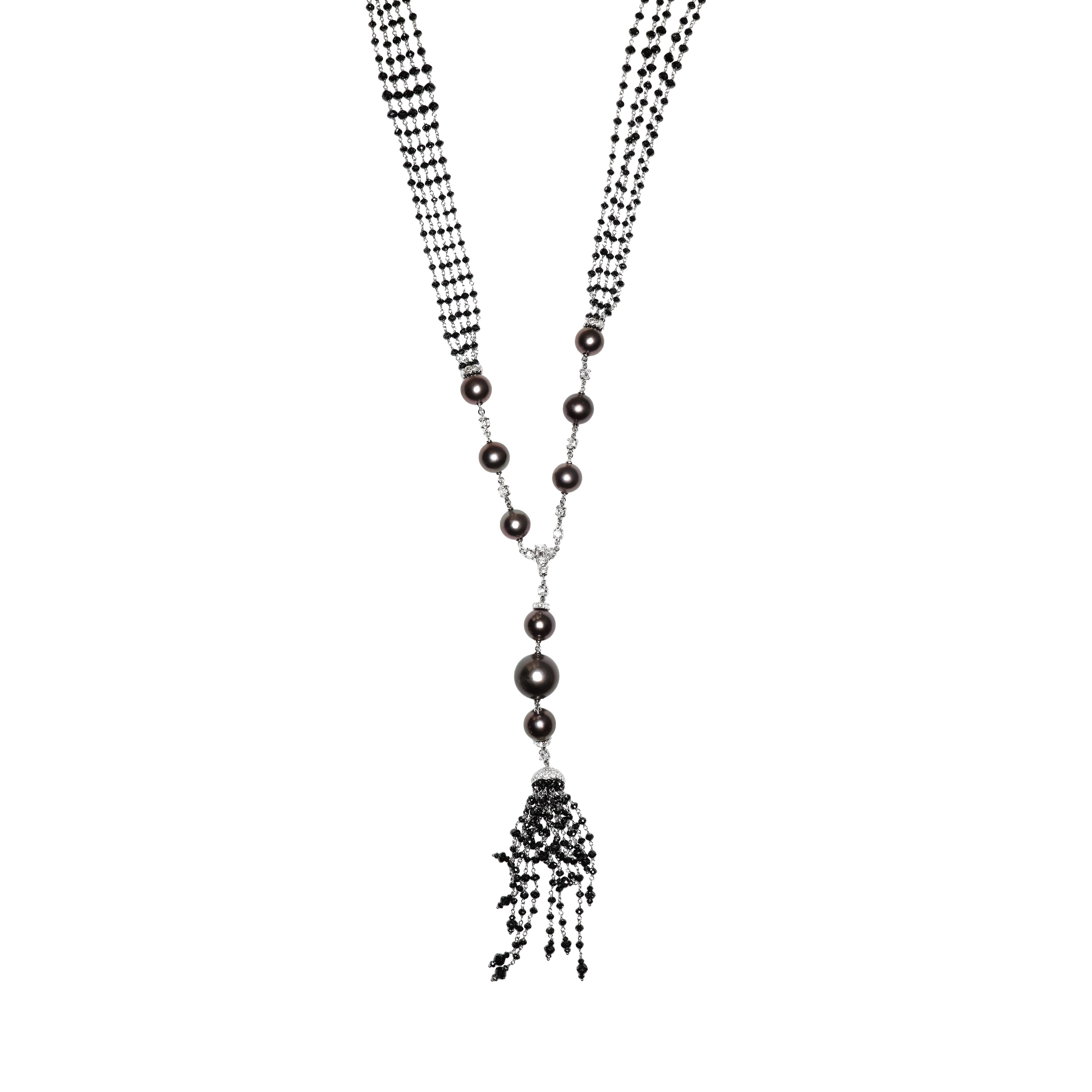 Busatti 18k gold collier necklace with black diamonds and dark pearls featuring tassel pendant design worn on model