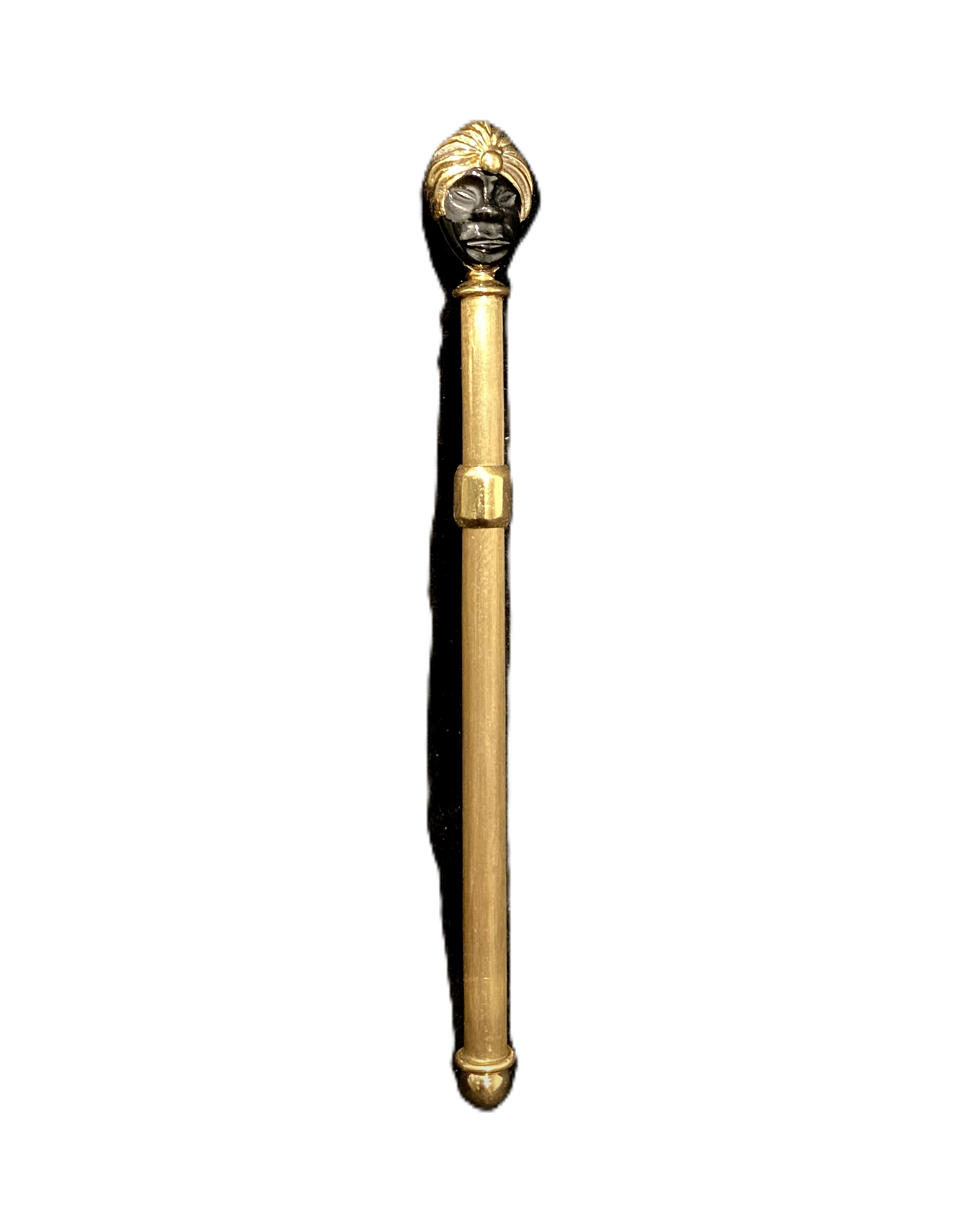 Barberis gold champagne and whiskey stirrer with sculptural handle and multi-prong base on black background