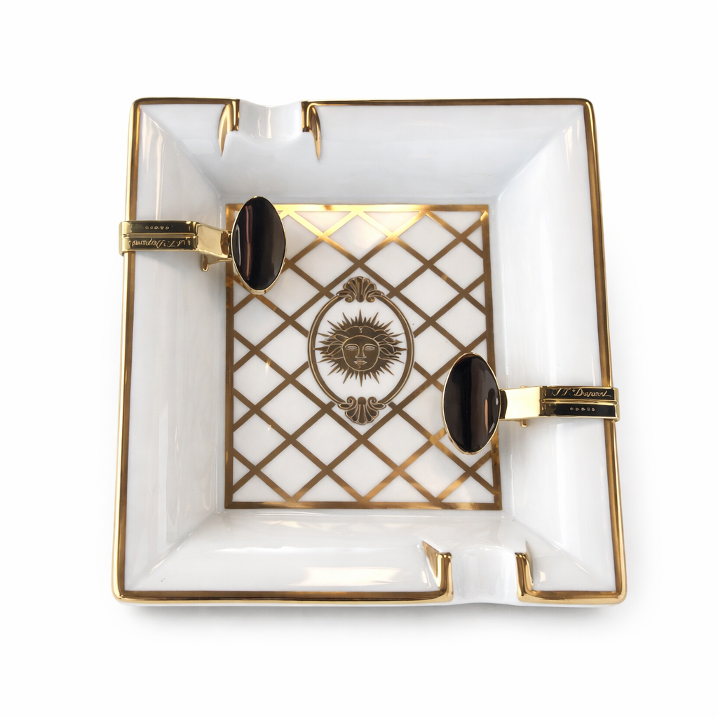 S.T. Dupont Versailles limited edition porcelain ashtray with gold detailing on white background