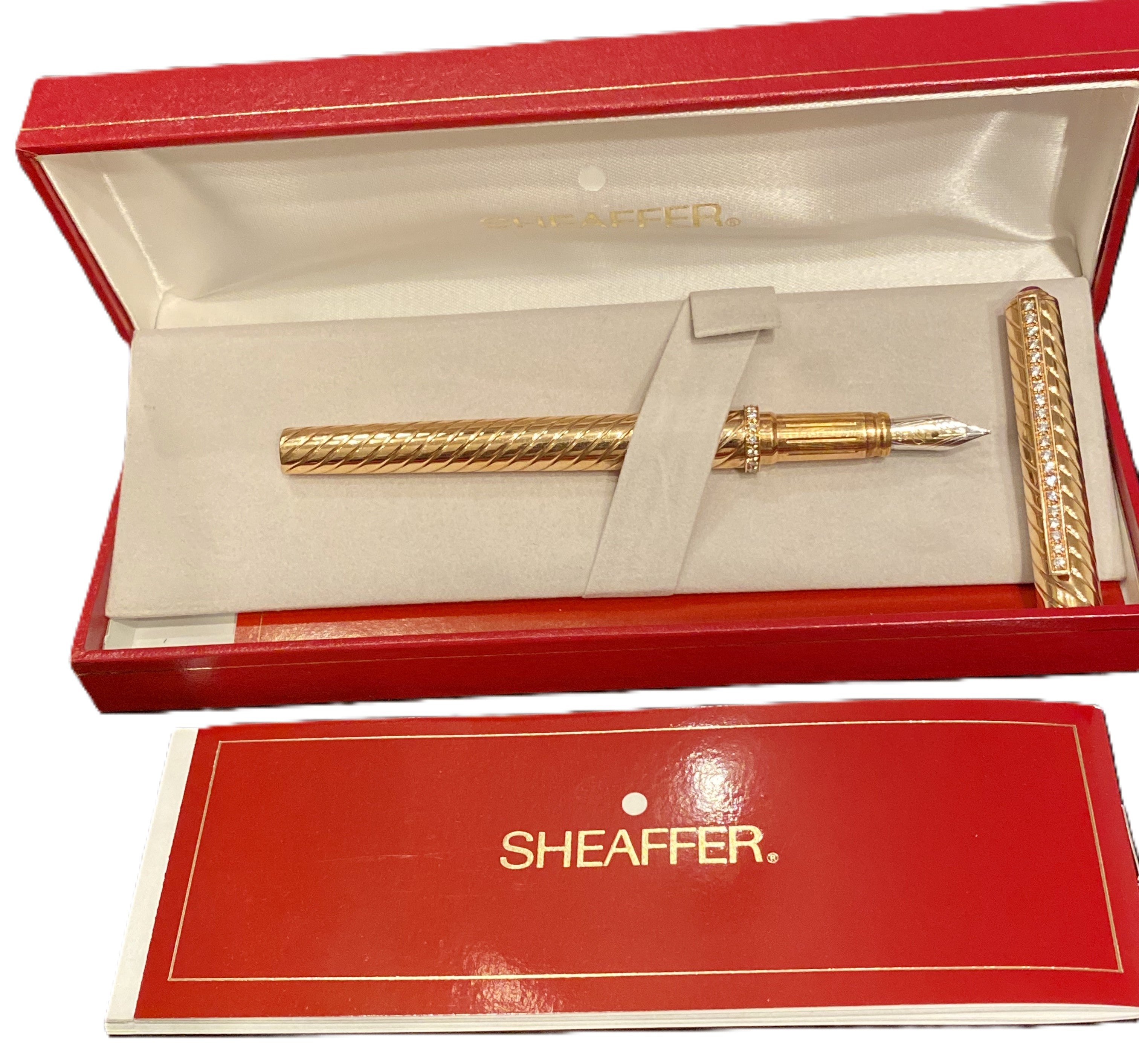 Sheaffer gold fountain pen with ruby detail in original red presentation box