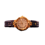 Luxury Maurice Lacroix gold ladies watch with blue strap on a woman’s wrist