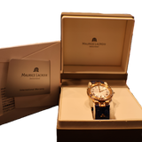 Maurice Lacroix women’s Swiss gold watch with blue leather strap worn on wrist, luxury timepiece