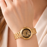 gold skeleton wristwatch for women Maurice Lacroix elegant luxury timepiece