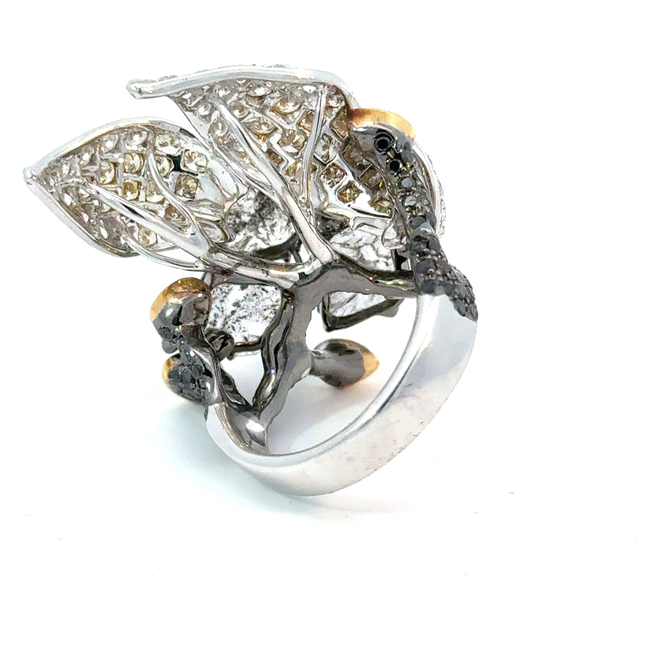 artistic diamond ring with raw and pavé diamonds