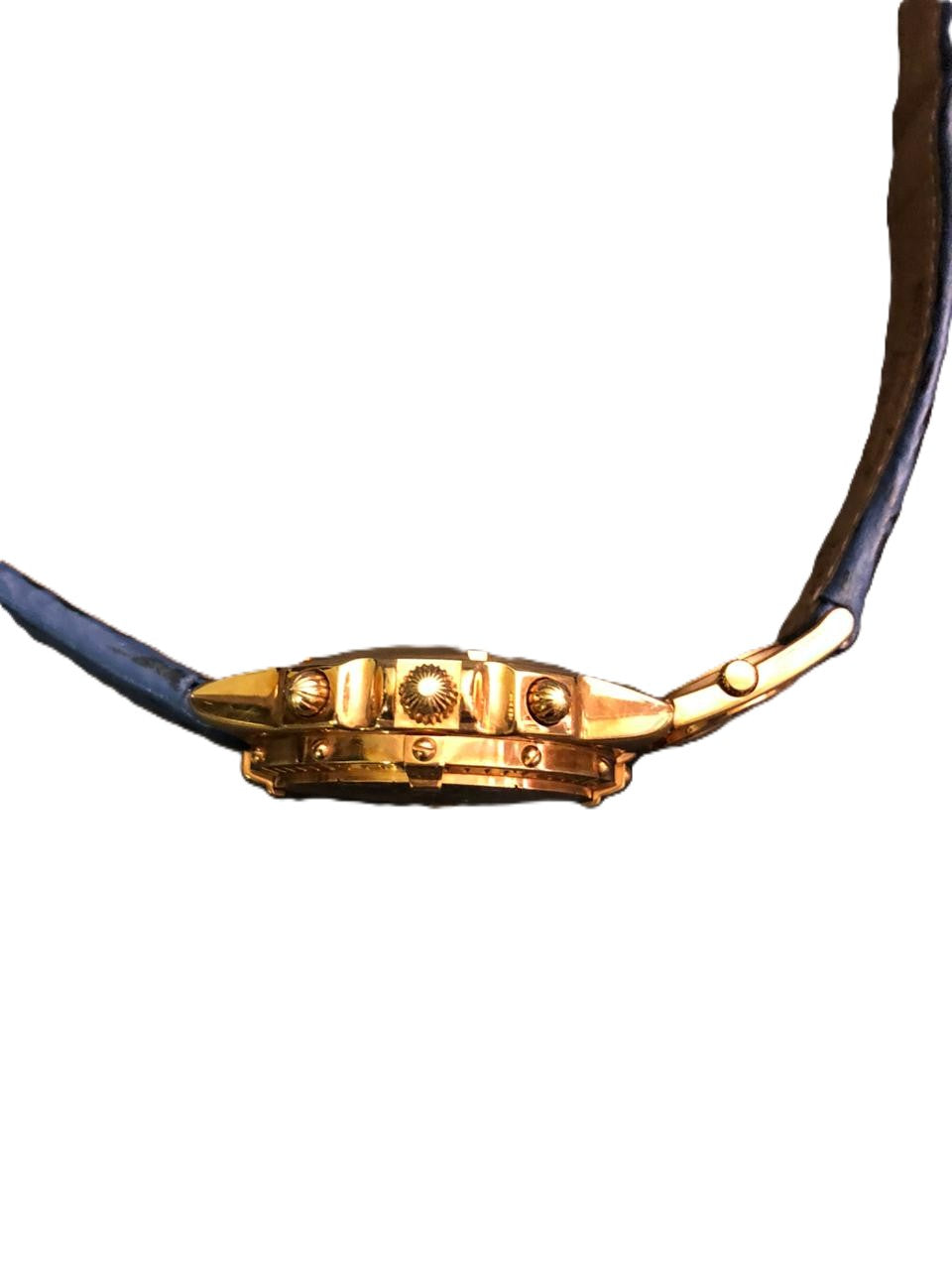 Breitling Chronomat 18K gold side profile showing crown, chronograph pushers and rider tab bezel