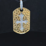detailed gold cross pendant with natural diamonds