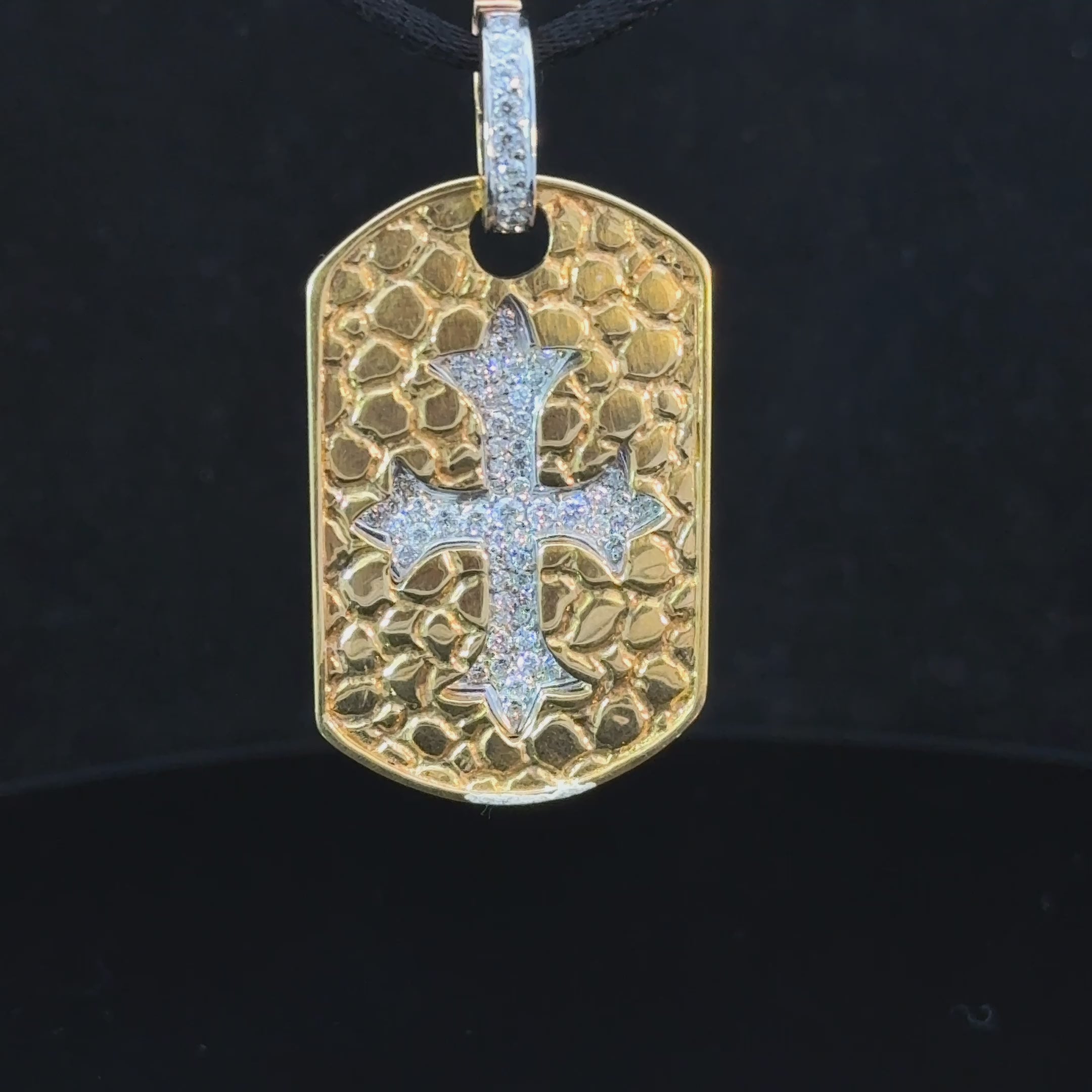 detailed gold cross pendant with natural diamonds